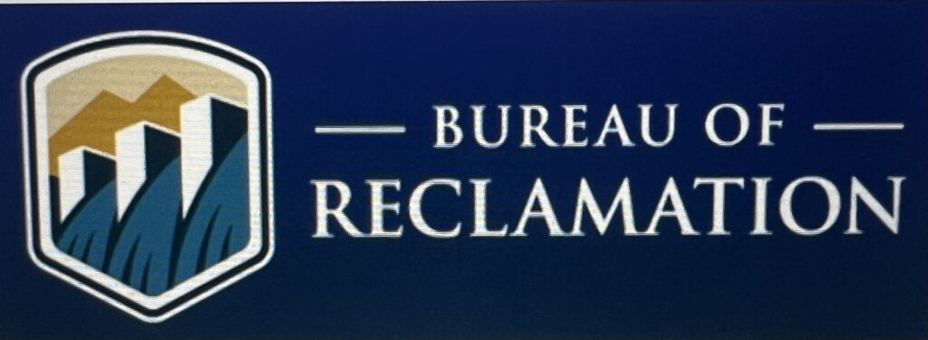 Bureau of Reclamation logo with dam and mountains
