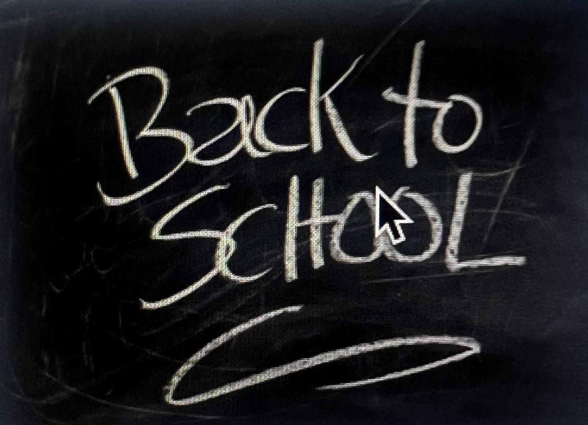 Stylized chalkboard writing 'Back to School' with arrow