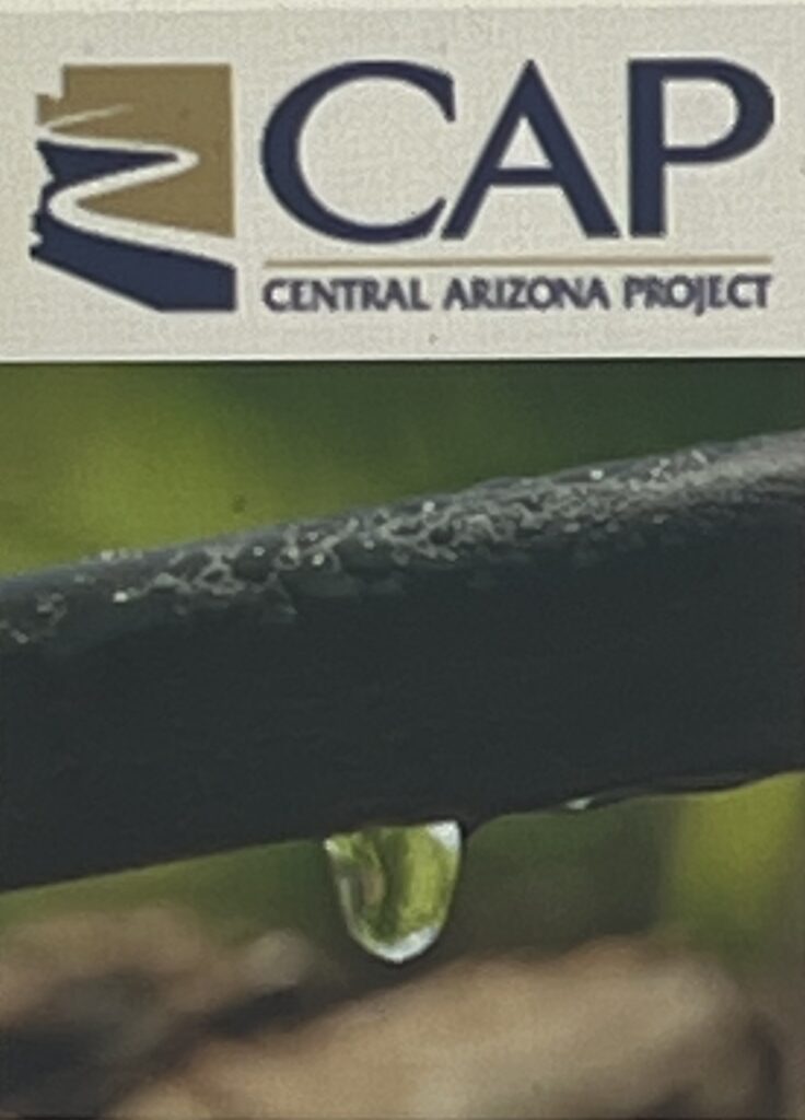 Droplet on irrigation tube under CAP logo