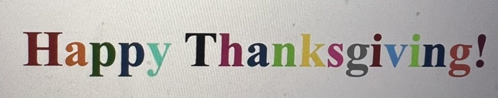 Multicolored Happy Thanksgiving! text on white