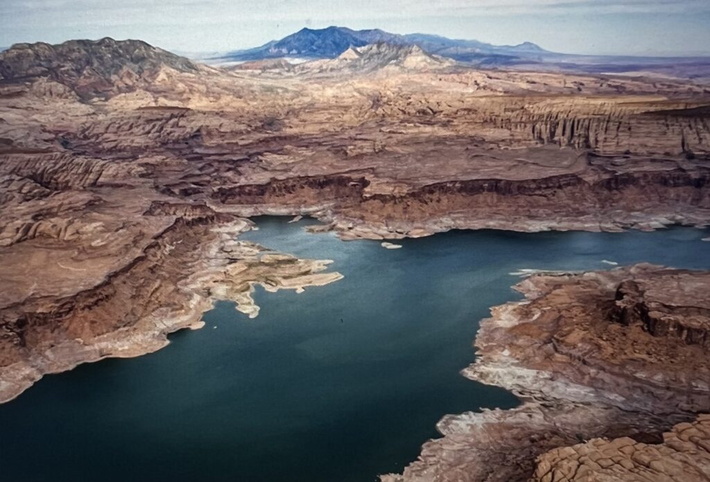 Aerial view of canyon with blue reservoir